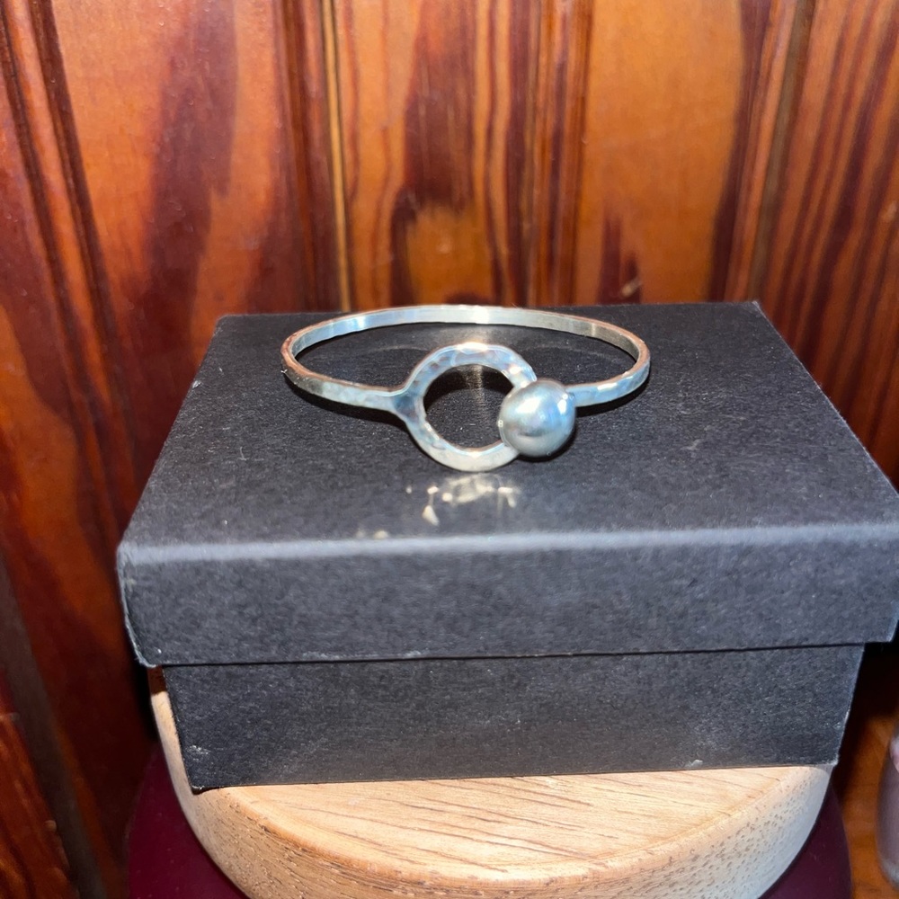 Handmade by a local blacksmith child size button bracelet. Sterling Silver